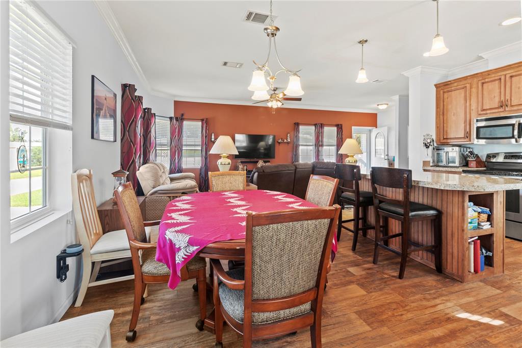 1 Meadow Circle Ellenton, FL 34222 - Photo 15 of 52 a dining room with furniture and window
