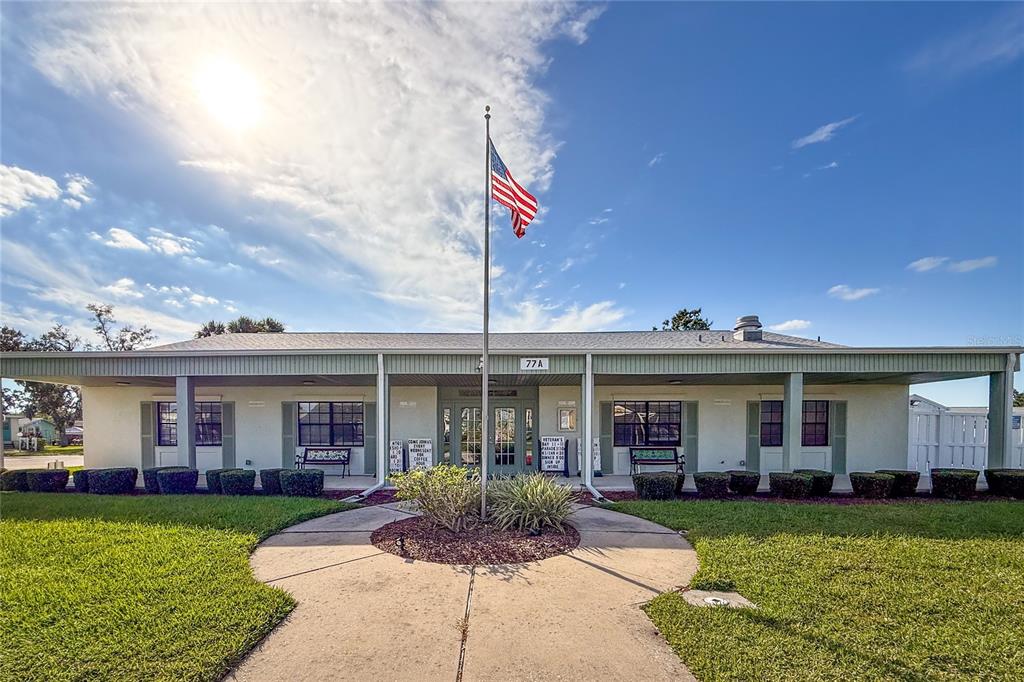 1 Meadow Circle Ellenton, FL 34222 - Photo 36 of 52 front view of a house with a yard