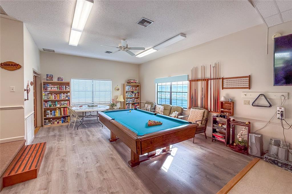 1 Meadow Circle Ellenton, FL 34222 - Photo 39 of 52 a room with lots of white furniture and window