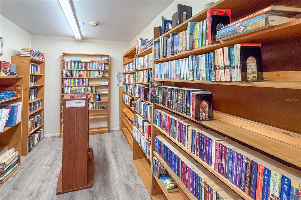 1 Meadow Circle Ellenton, FL 34222 - Photo 41 of 52 a book shelf with an empty room