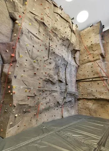 a room with lots of gym equipment