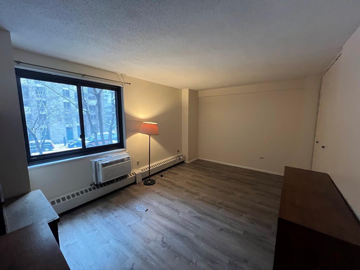77 Fulton Street, Unit 2J Manhattan, NY 10038 - Photo 12 of 20 a room with window