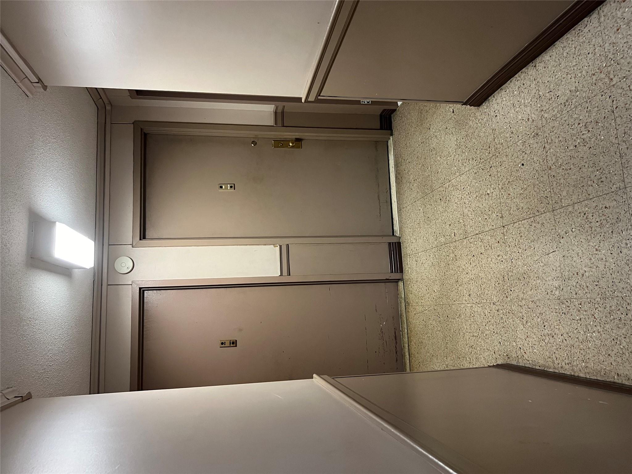 77 Fulton Street, Unit 2J Manhattan, NY 10038 - Photo 4 of 20 an empty room with closet