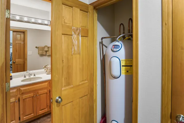 a bathroom with a mirror and a shower