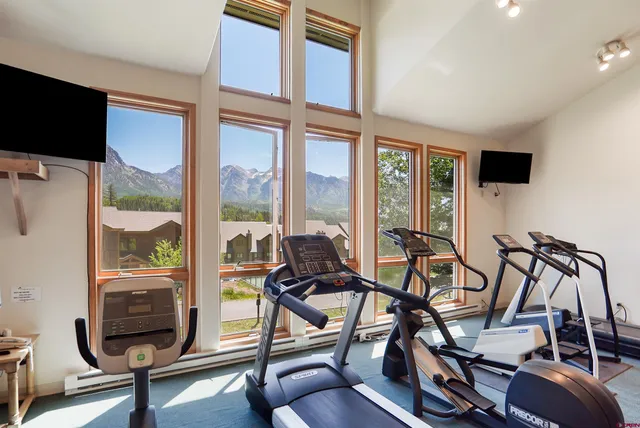 a view of a room with gym equipment