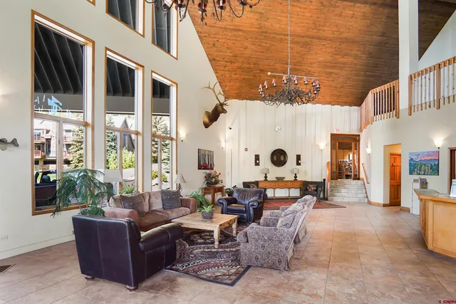 a view of the patio with dining table and chairs