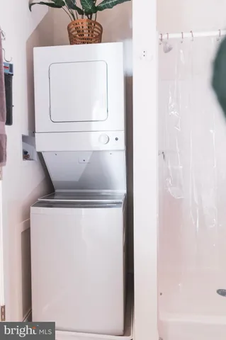 a bathroom with a sink toilet and mirror