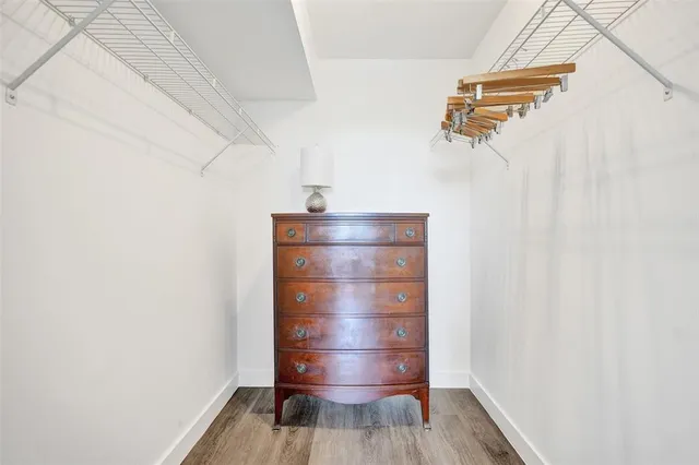 a bathroom with a sink a toilet and vanity