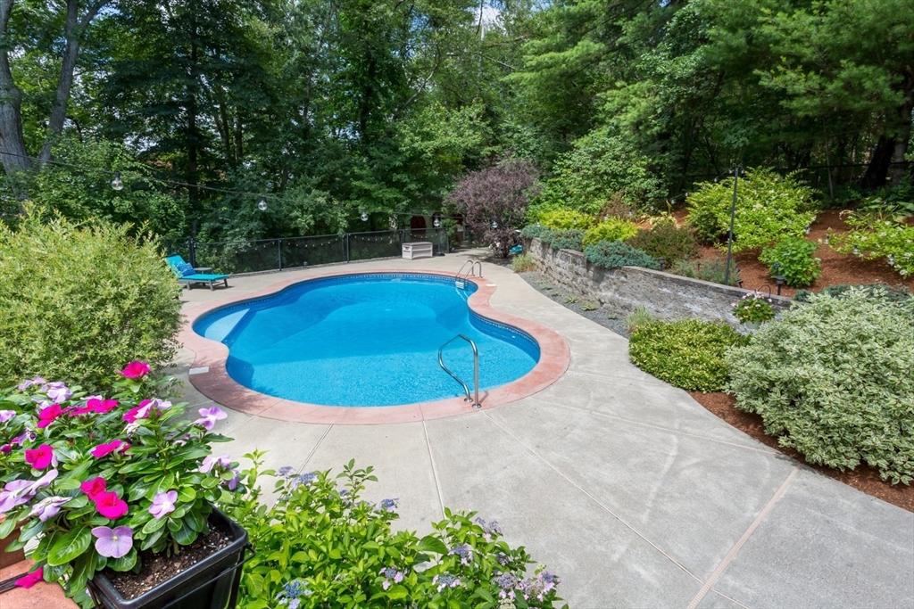 5 Wadsworth Farm Road Franklin, MA 02038 - Photo 35 of 42 a view of a swimming pool in he middle of the outdoor