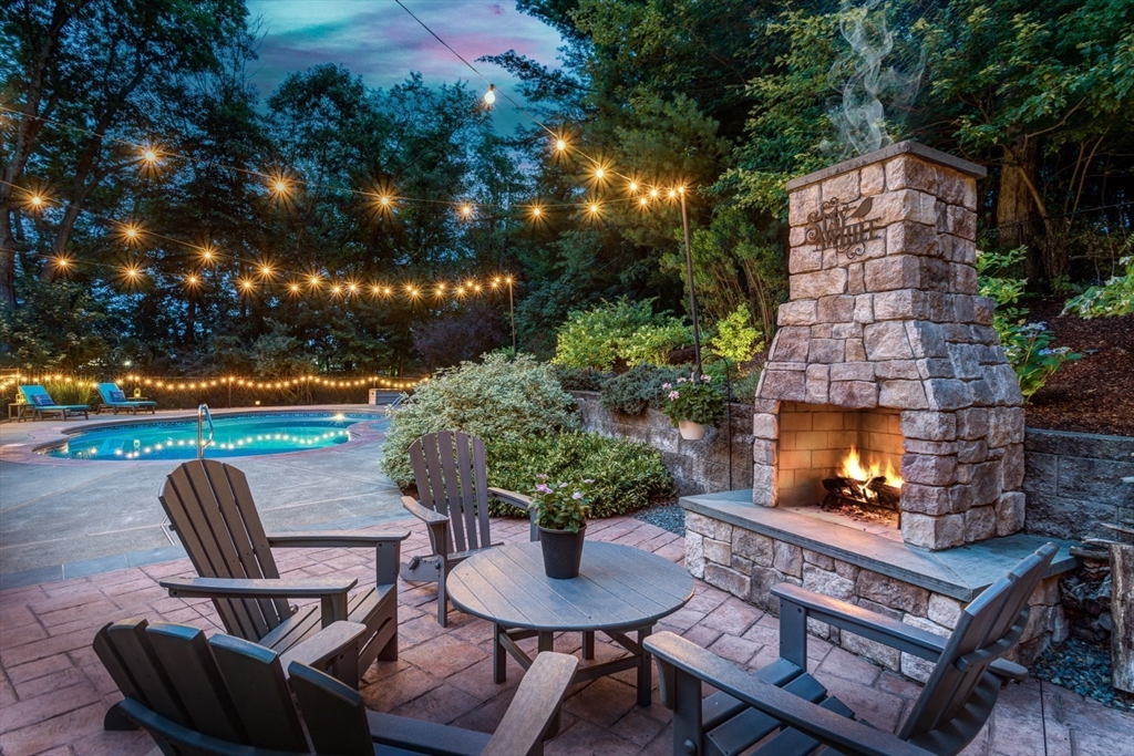 5 Wadsworth Farm Road Franklin, MA 02038 - Photo 40 of 42 a view of a chairs and table in backyard