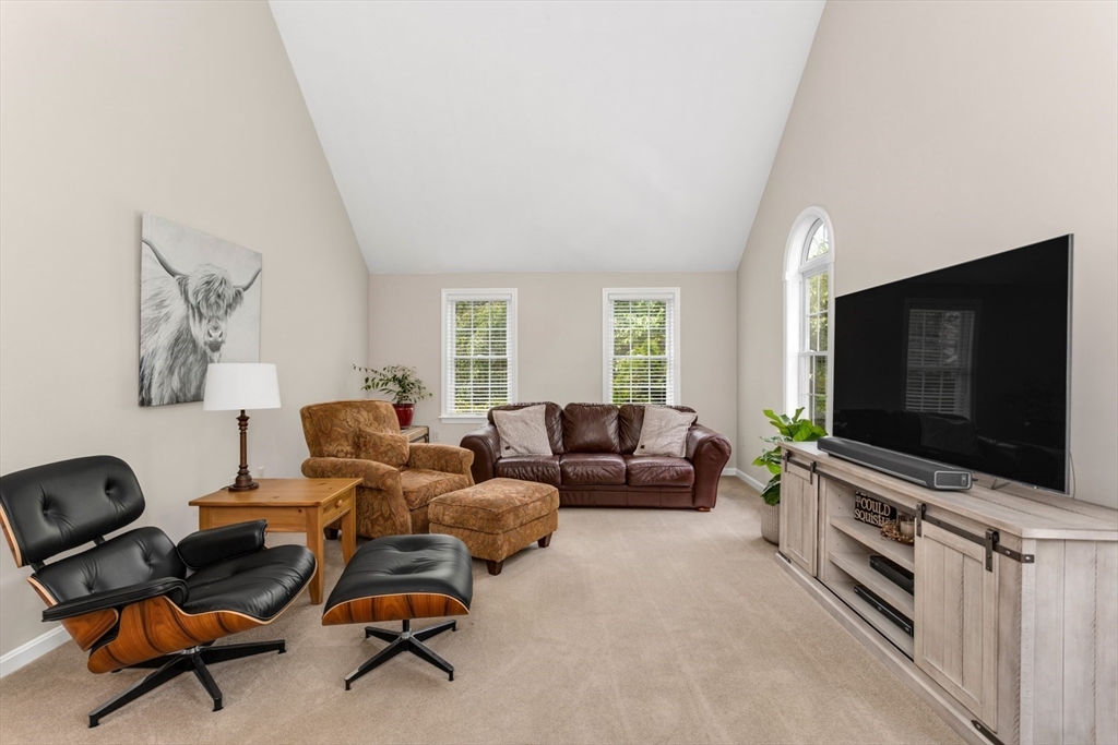 5 Wadsworth Farm Road Franklin, MA 02038 - Photo 4 of 42 a living room with furniture and a flat screen tv