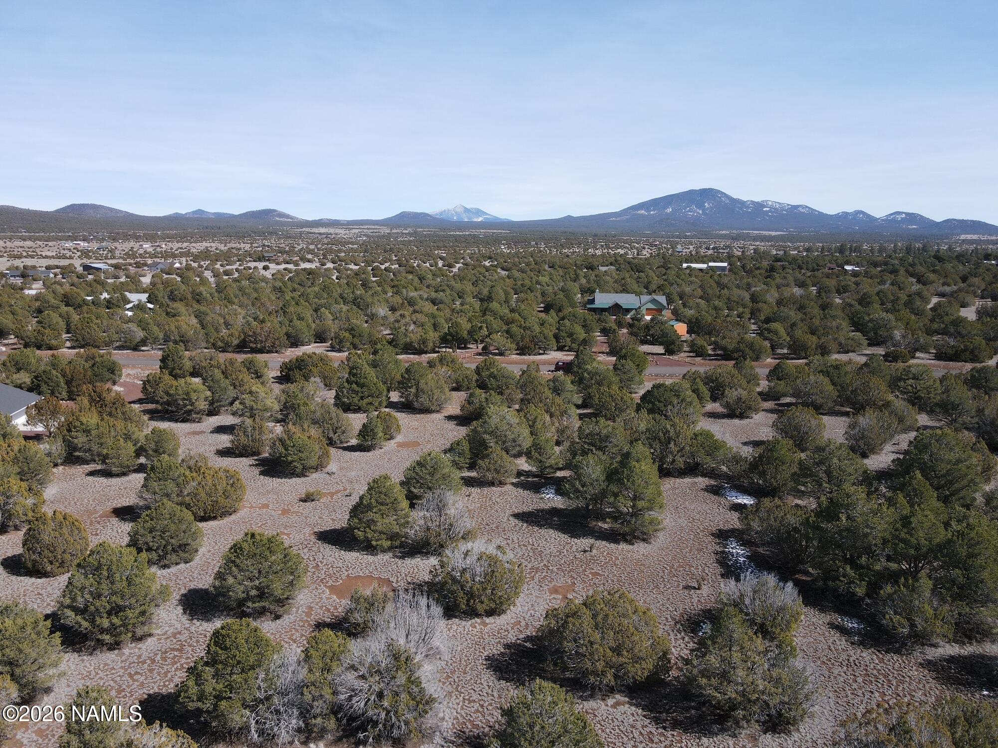 7590 Daisy Drive Williams, AZ 86046 - Photo 7 of 21 a view of a town with mountains in the background