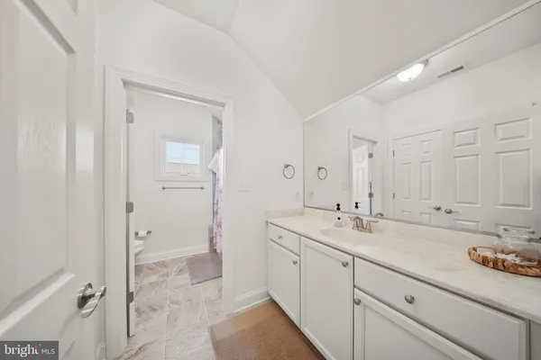 a view of a house with a large window