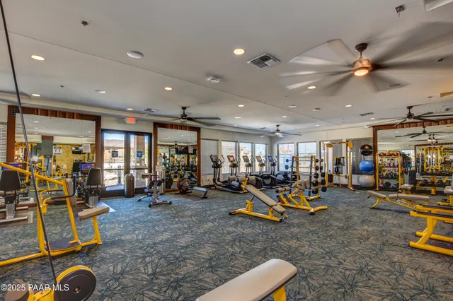 a view of a dining area with furniture and a table