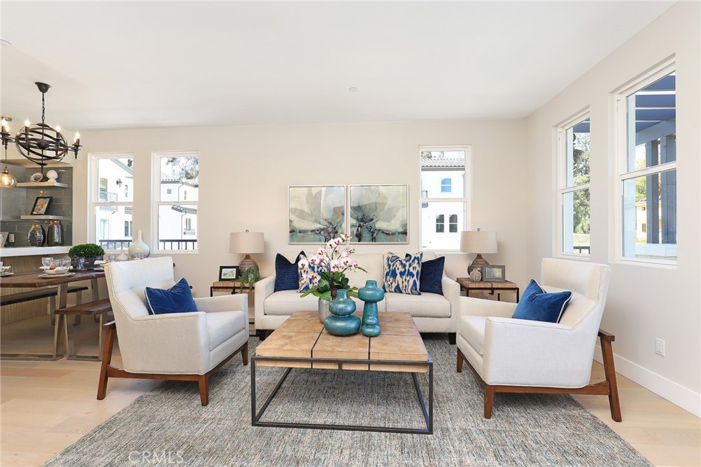 6 Bethpage Lane Phillips Ranch, CA 91766 - Photo 11 of 63 a living room with furniture and a large window