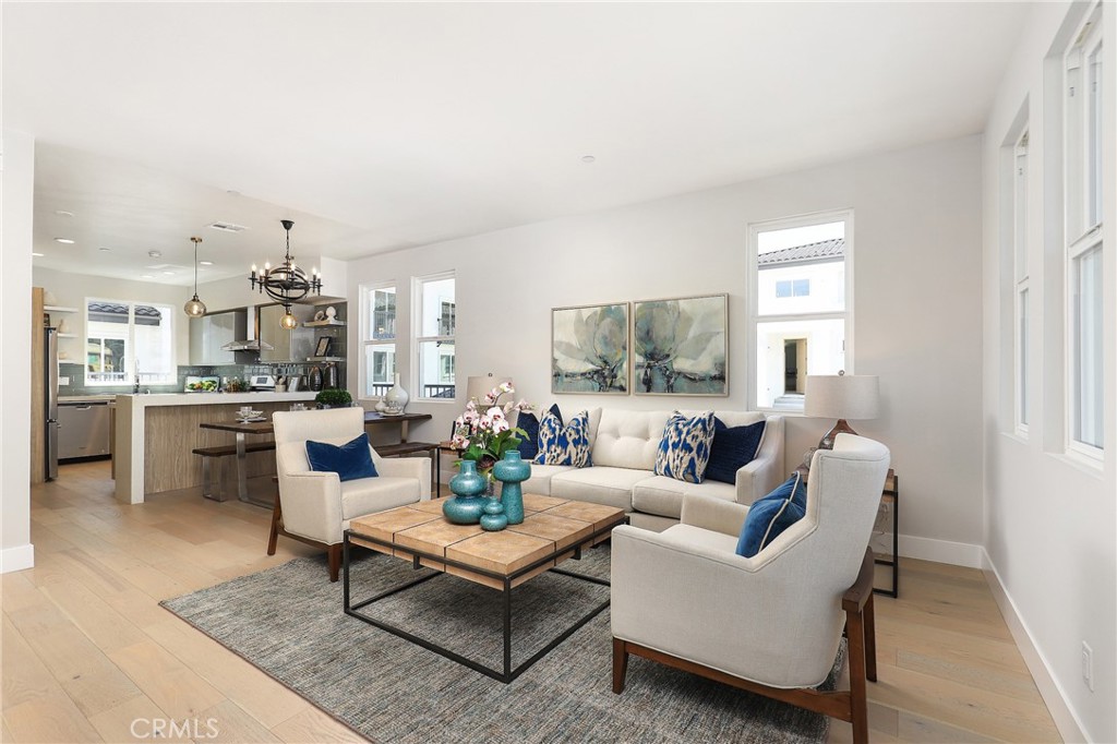 6 Bethpage Lane Phillips Ranch, CA 91766 - Photo 9 of 63 a living room with furniture and a view of kitchen