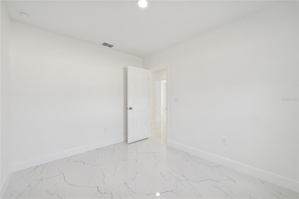 4033 Buttonbush Circle Lakeland, FL 33811 - Photo 28 of 33 a view of an empty room