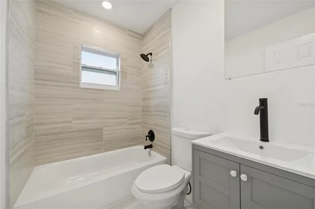 a bathroom with a shower and a shower