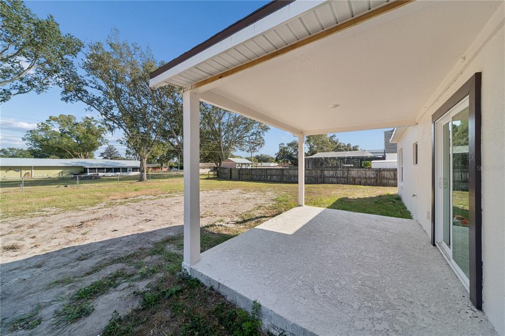 4033 Buttonbush Circle Lakeland, FL 33811 - Photo 32 of 33 a view of a backyard with ocean view