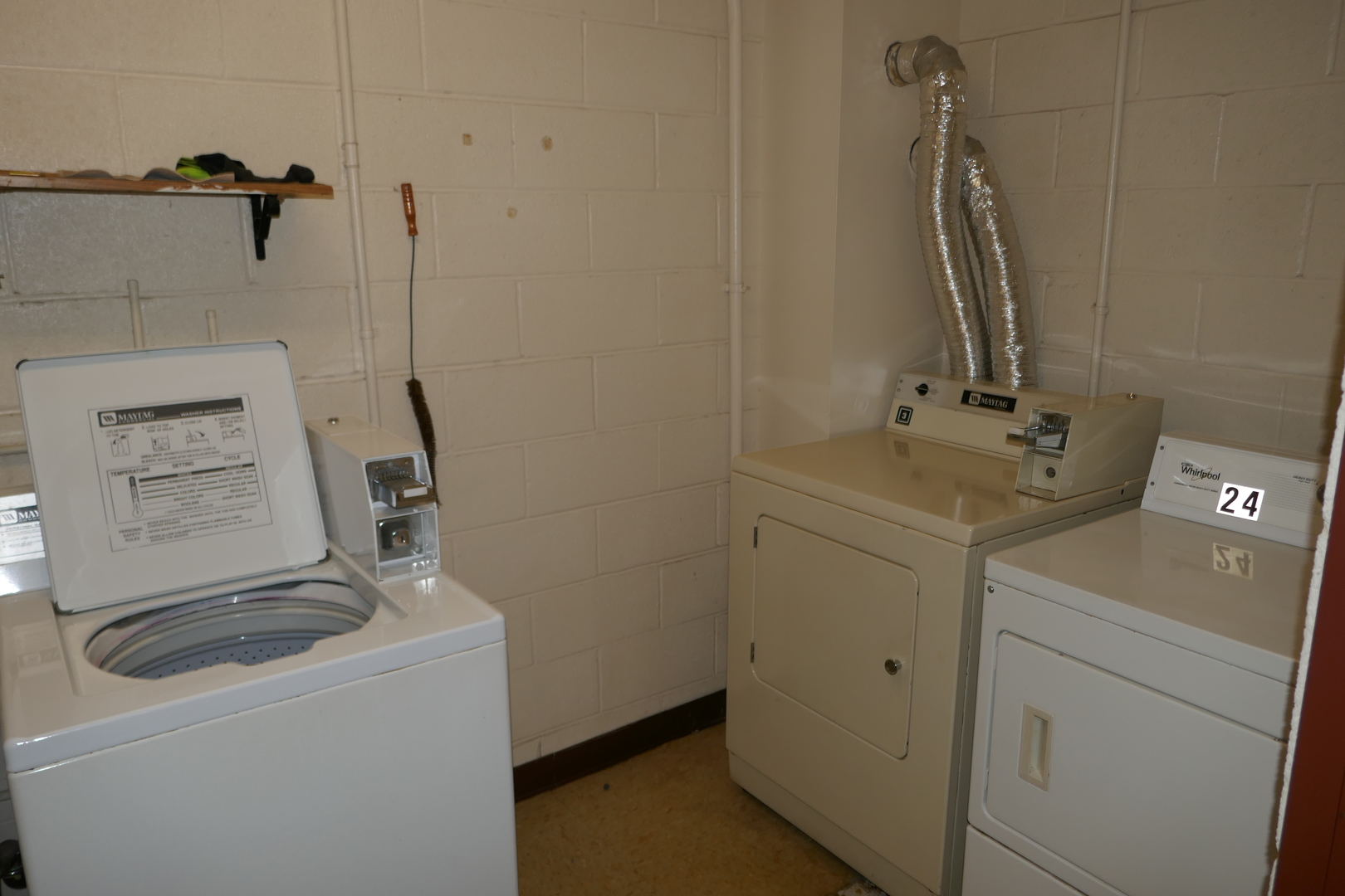 603 South River Road, Unit 2M Des Plaines, IL 60016 - Photo 17 of 20 a bathroom with a sink and washing machine