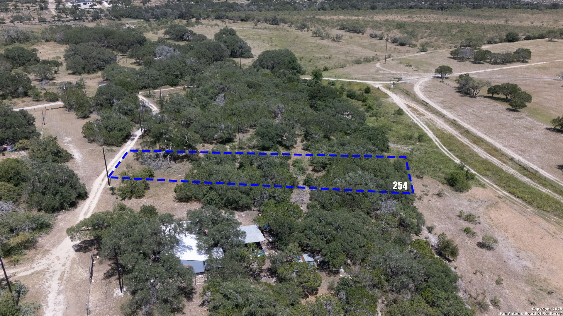 254 Recreation Spring Branch, TX 78133 - Photo 5 of 13 a view of a garden with flowers