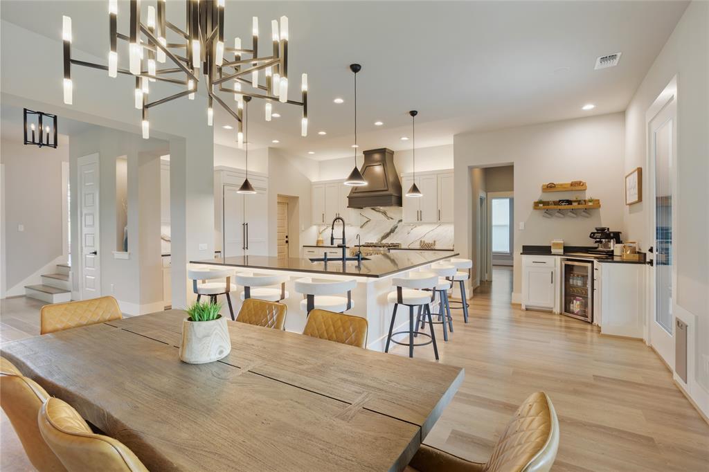 1095 Sister Grove Road Van Alstyne, TX 75495 - Photo 8 of 35 .Check out the lighting in this open kitchen and dining room. Even more elegant in person.