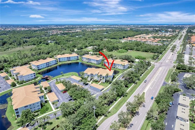 an aerial view of a house with a garden space
