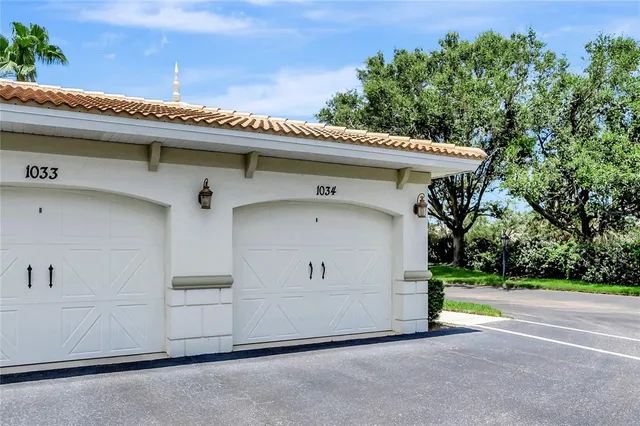 a large kitchen with stainless steel appliances granite countertop a sink stove and cabinets