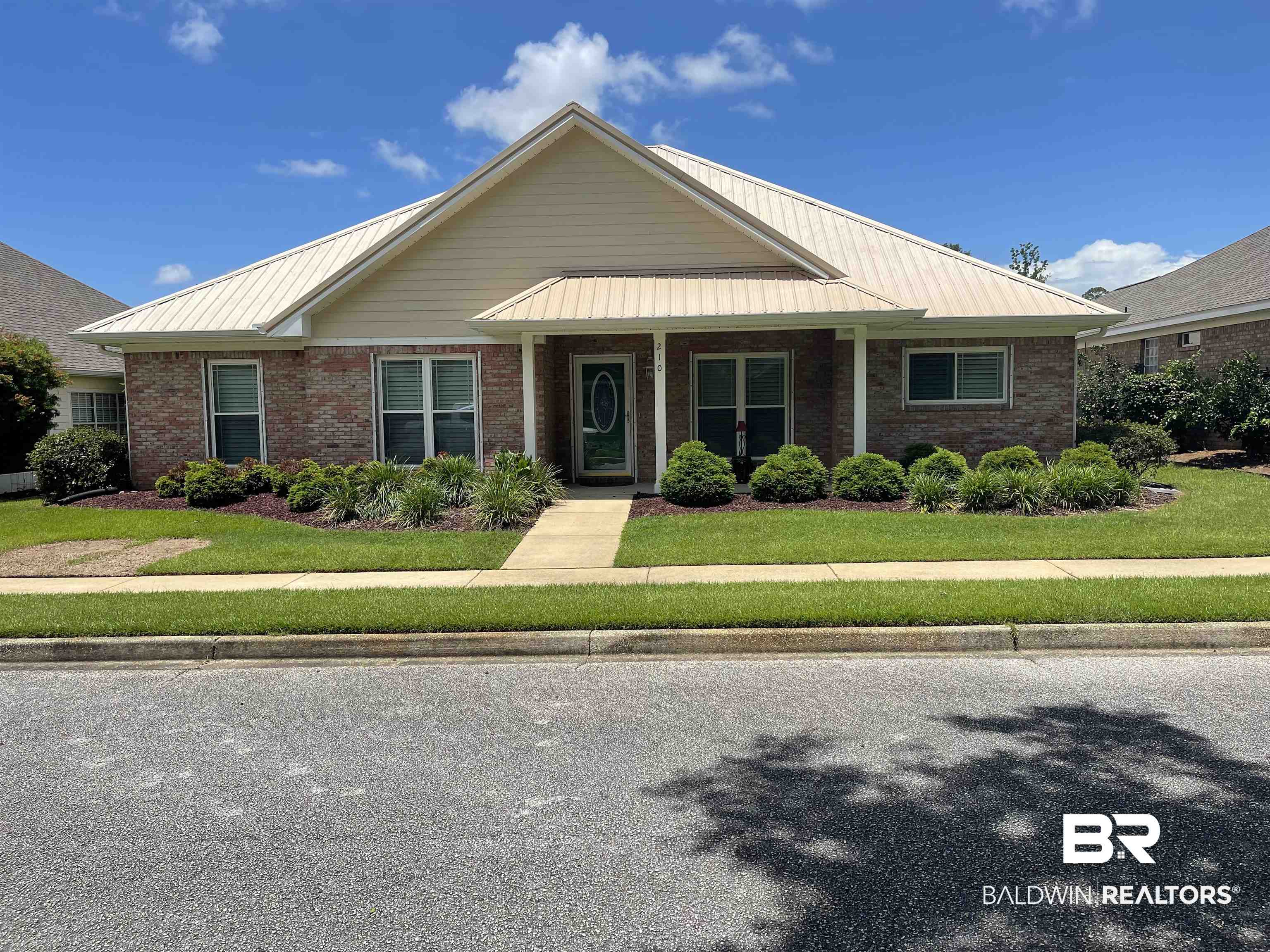210 Savannah Circle Foley, AL 36535 - Photo 1 of 18 View of front facade with a front lawn