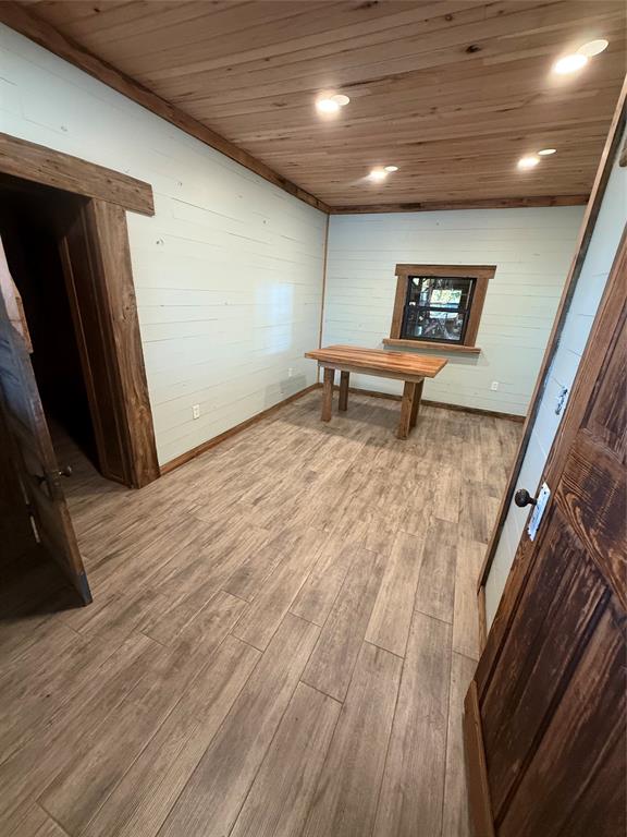 147 Wilson Loop Benton, LA 71006 - Photo 7 of 11 a view of empty room with wooden floor