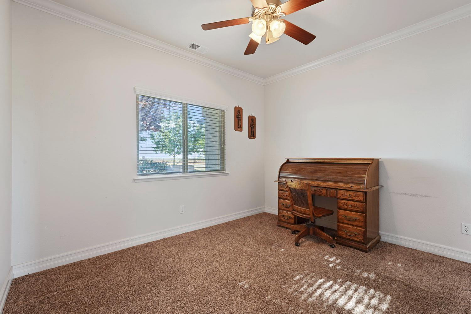 6120 Eschinger Road Elk Grove, CA 95757 - Photo 16 of 39 a living room with furniture and a window