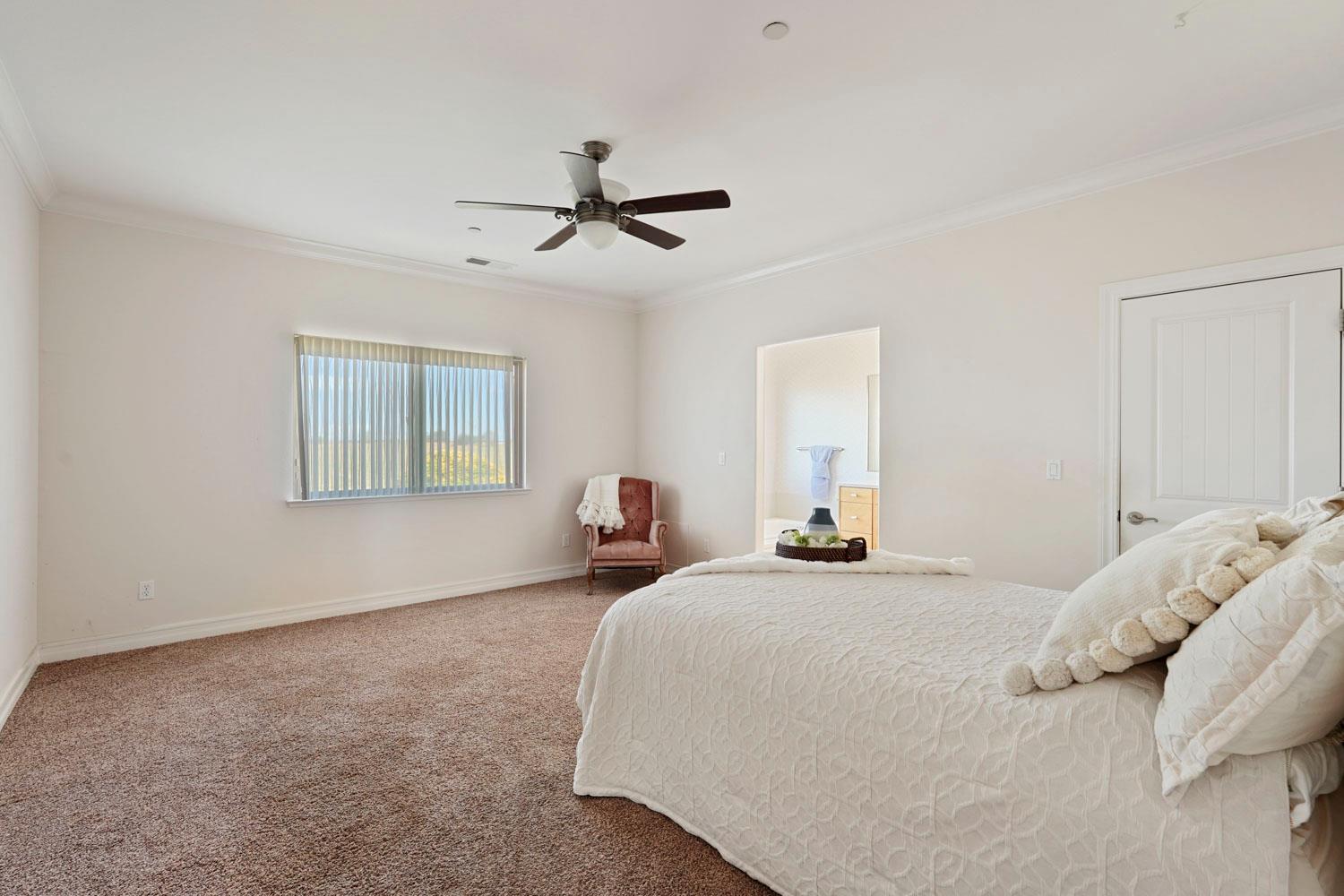 6120 Eschinger Road Elk Grove, CA 95757 - Photo 19 of 39 a bedroom with a bed and a window
