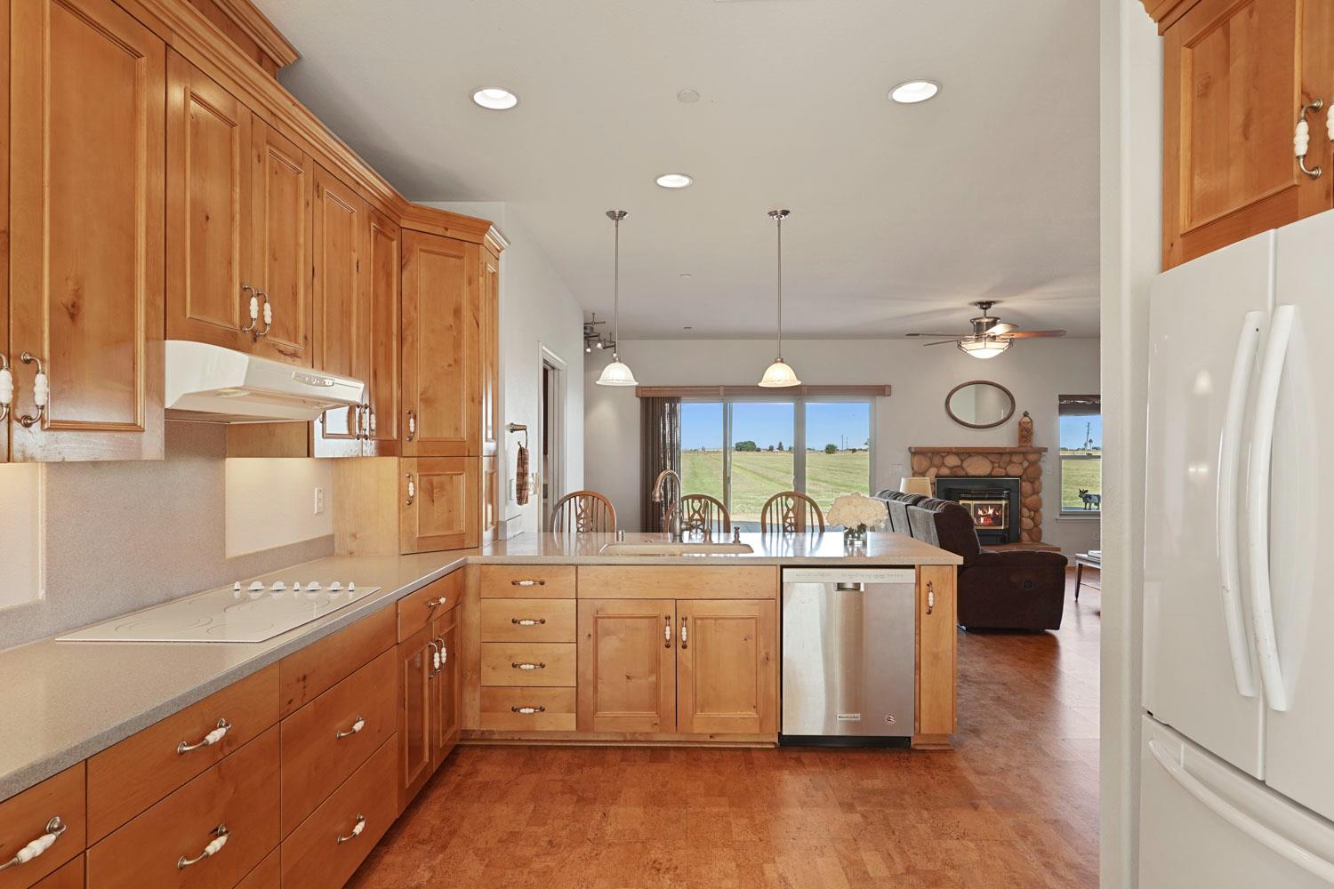 6120 Eschinger Road Elk Grove, CA 95757 - Photo 2 of 39 a large kitchen with a lot of counter space and appliances