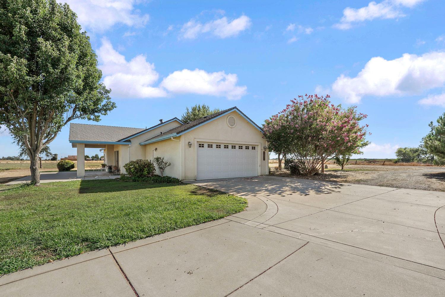 6120 Eschinger Road Elk Grove, CA 95757 - Photo 31 of 39 a view of a house with a yard