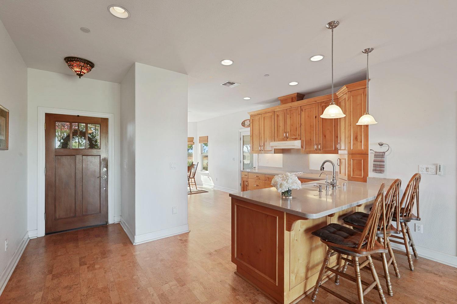 6120 Eschinger Road Elk Grove, CA 95757 - Photo 6 of 39 a dining room with furniture and a chandelier