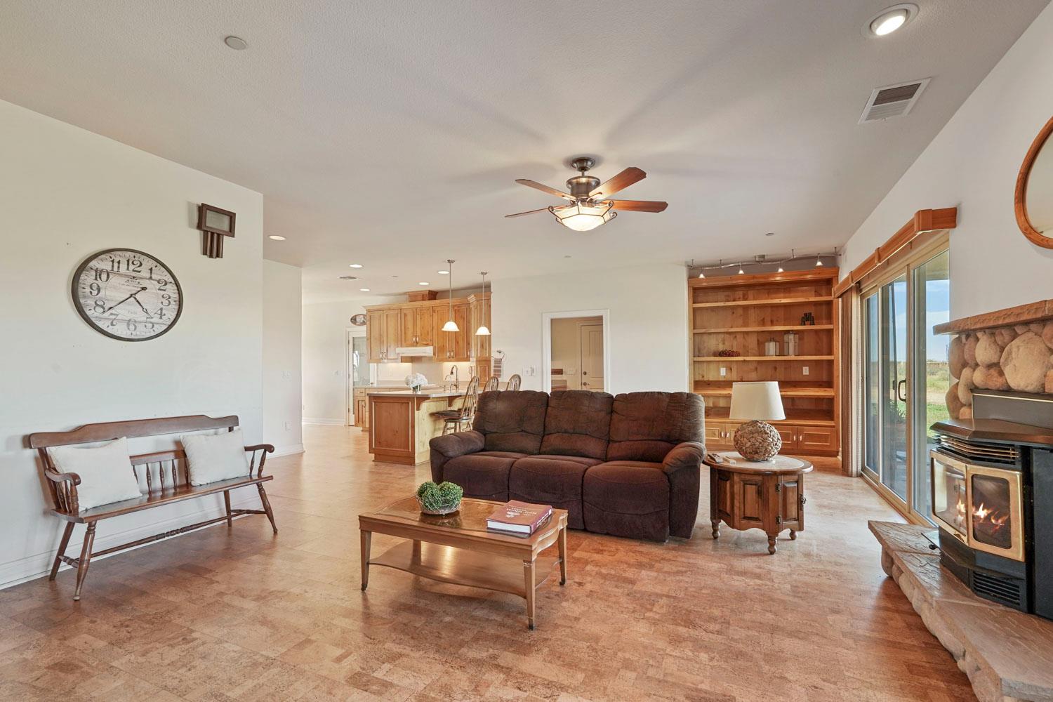 6120 Eschinger Road Elk Grove, CA 95757 - Photo 10 of 39 a living room with furniture and a flat screen tv
