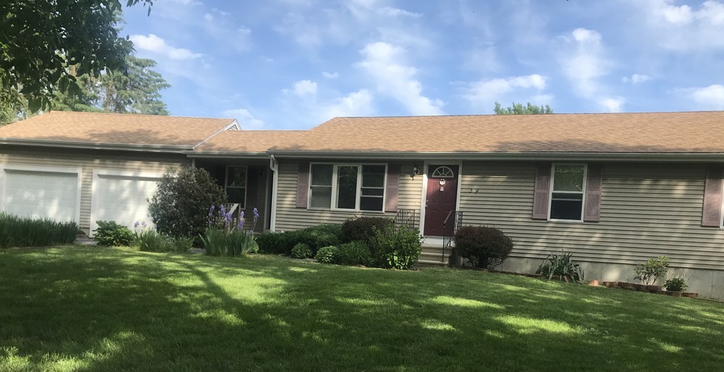 39 Boston Hill Road Fairhaven, MA 02719 - Photo 1 of 16 a view of a house with a garden