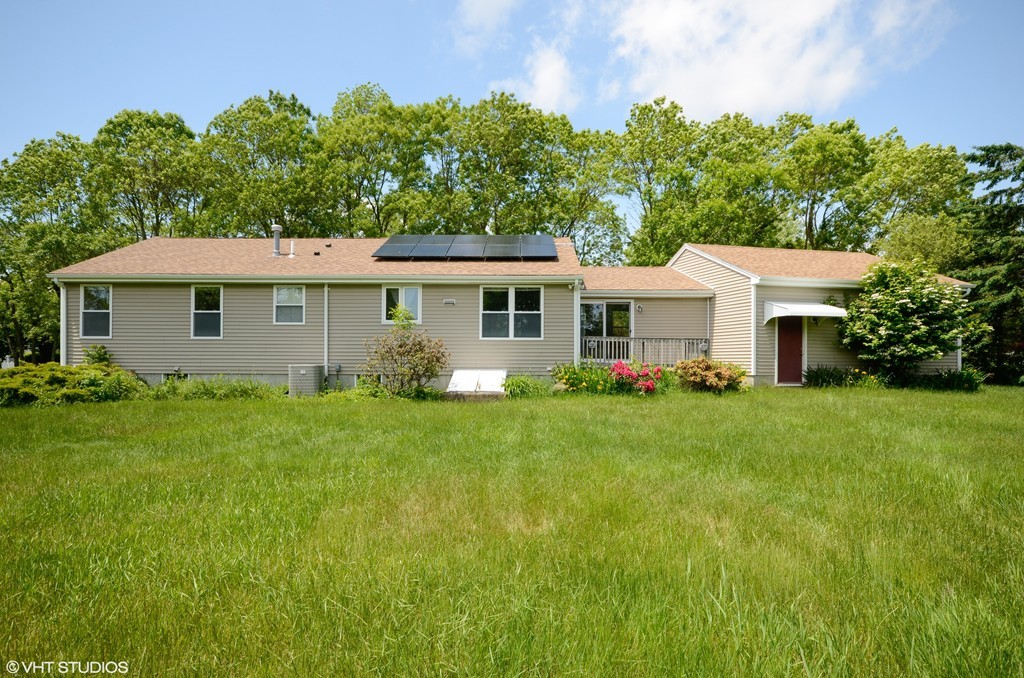 39 Boston Hill Road Fairhaven, MA 02719 - Photo 16 of 16 a front view of a house with a yard