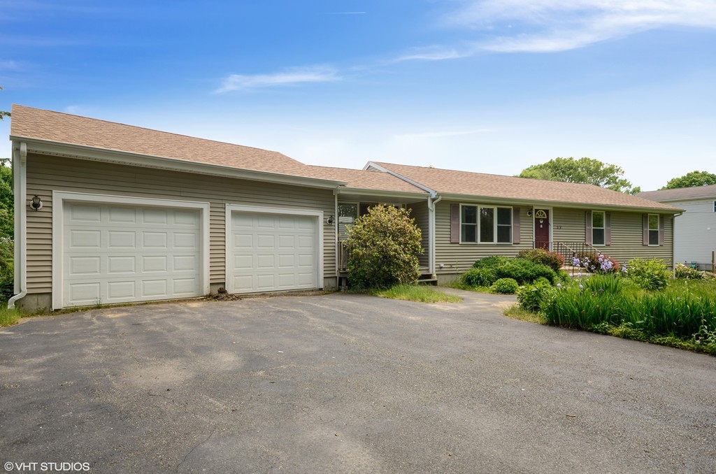 39 Boston Hill Road Fairhaven, MA 02719 - Photo 2 of 16 front view of a house with a street