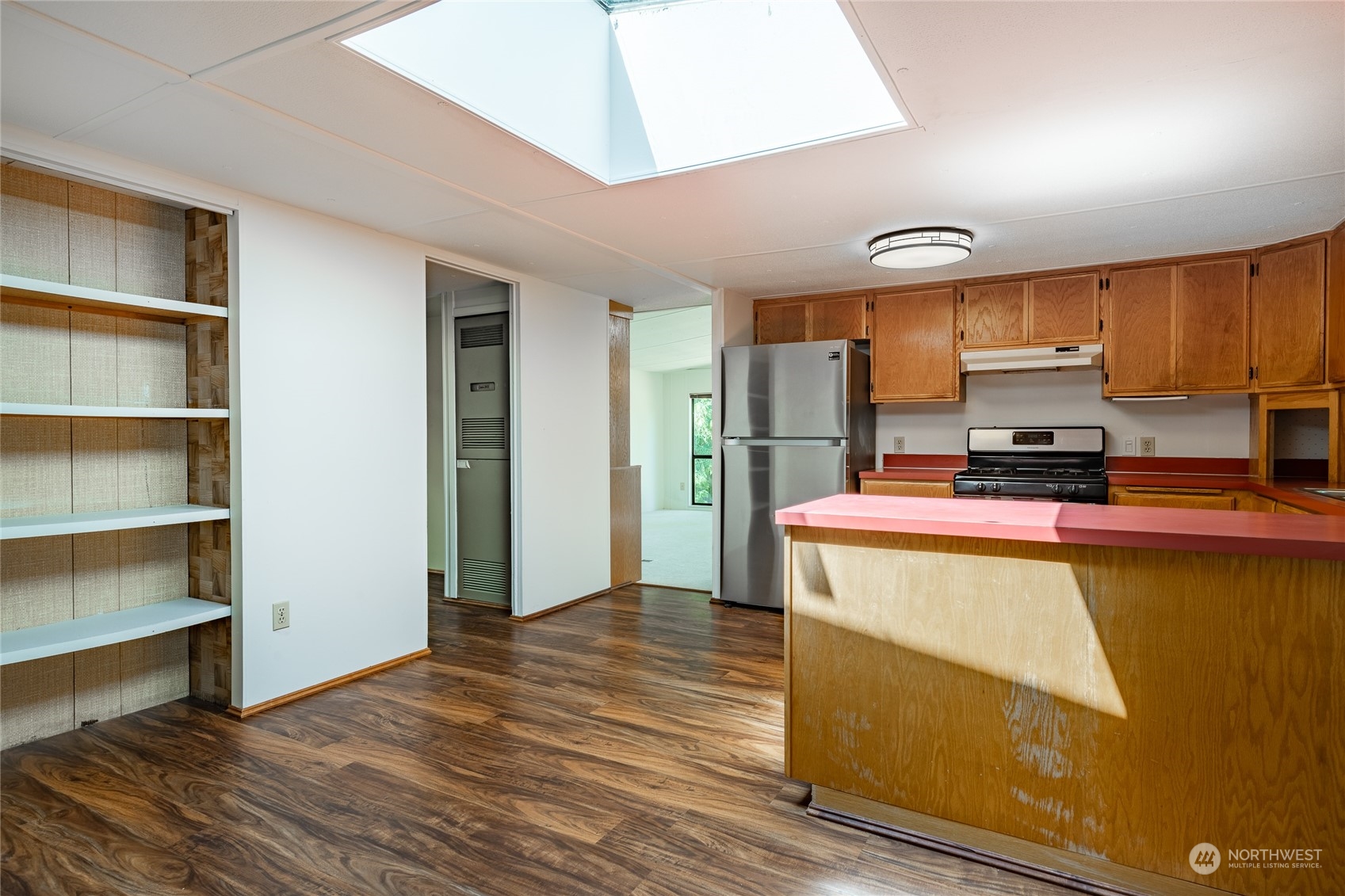 4915 Samish Way, Unit 7 Bellingham, WA 98229 - Photo 11 of 26 a view of kitchen with furniture and wooden floor