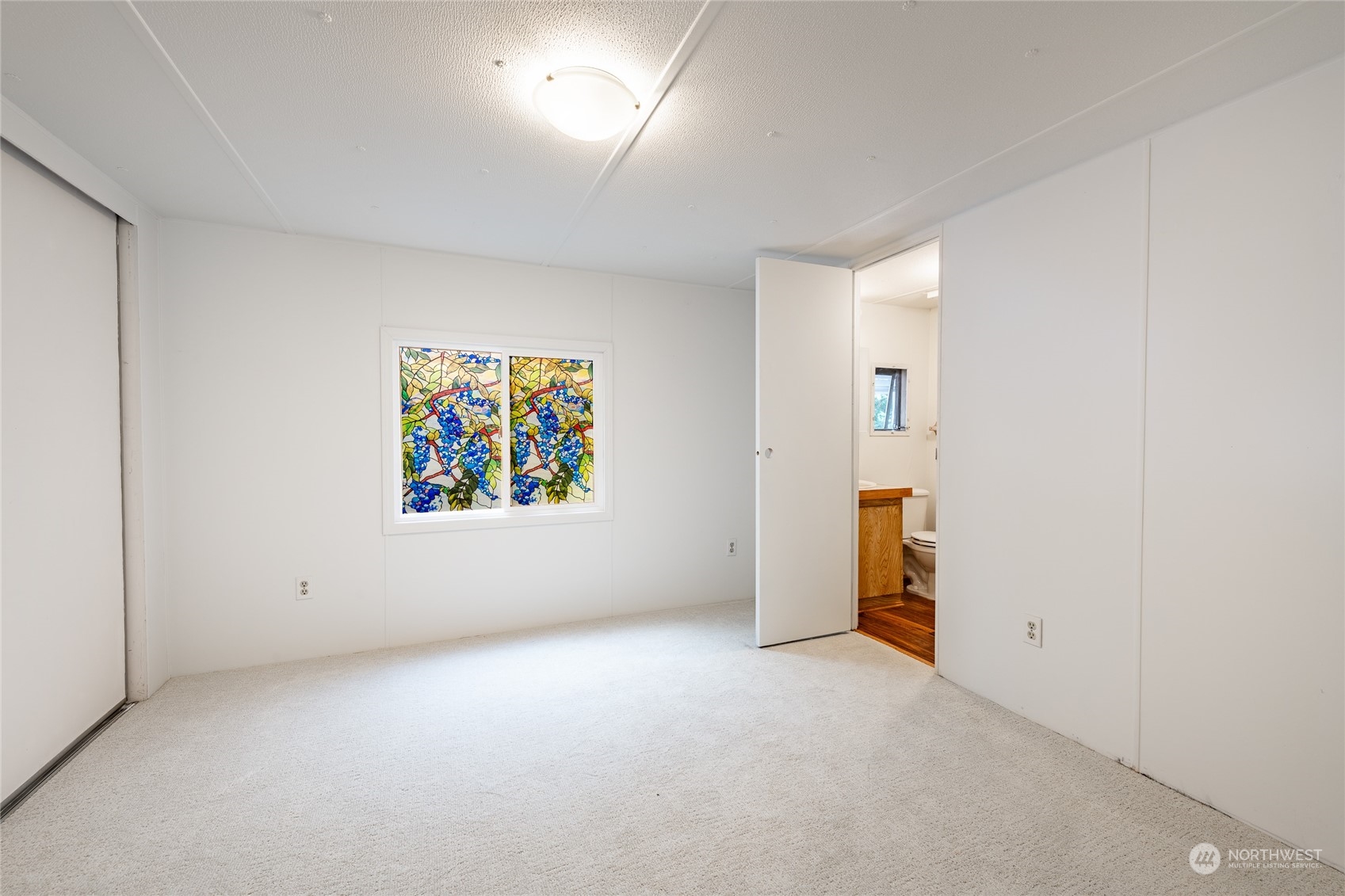 4915 Samish Way, Unit 7 Bellingham, WA 98229 - Photo 15 of 26 an empty room with windows