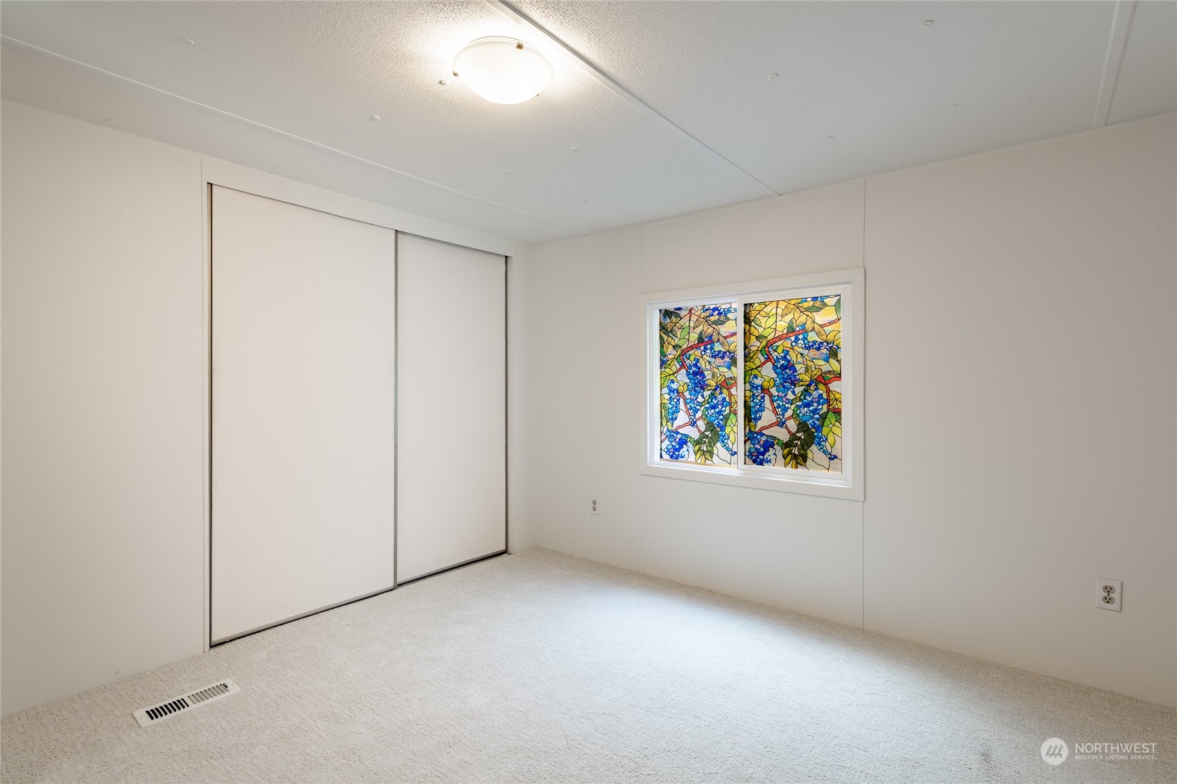 4915 Samish Way, Unit 7 Bellingham, WA 98229 - Photo 16 of 26 an empty room with windows