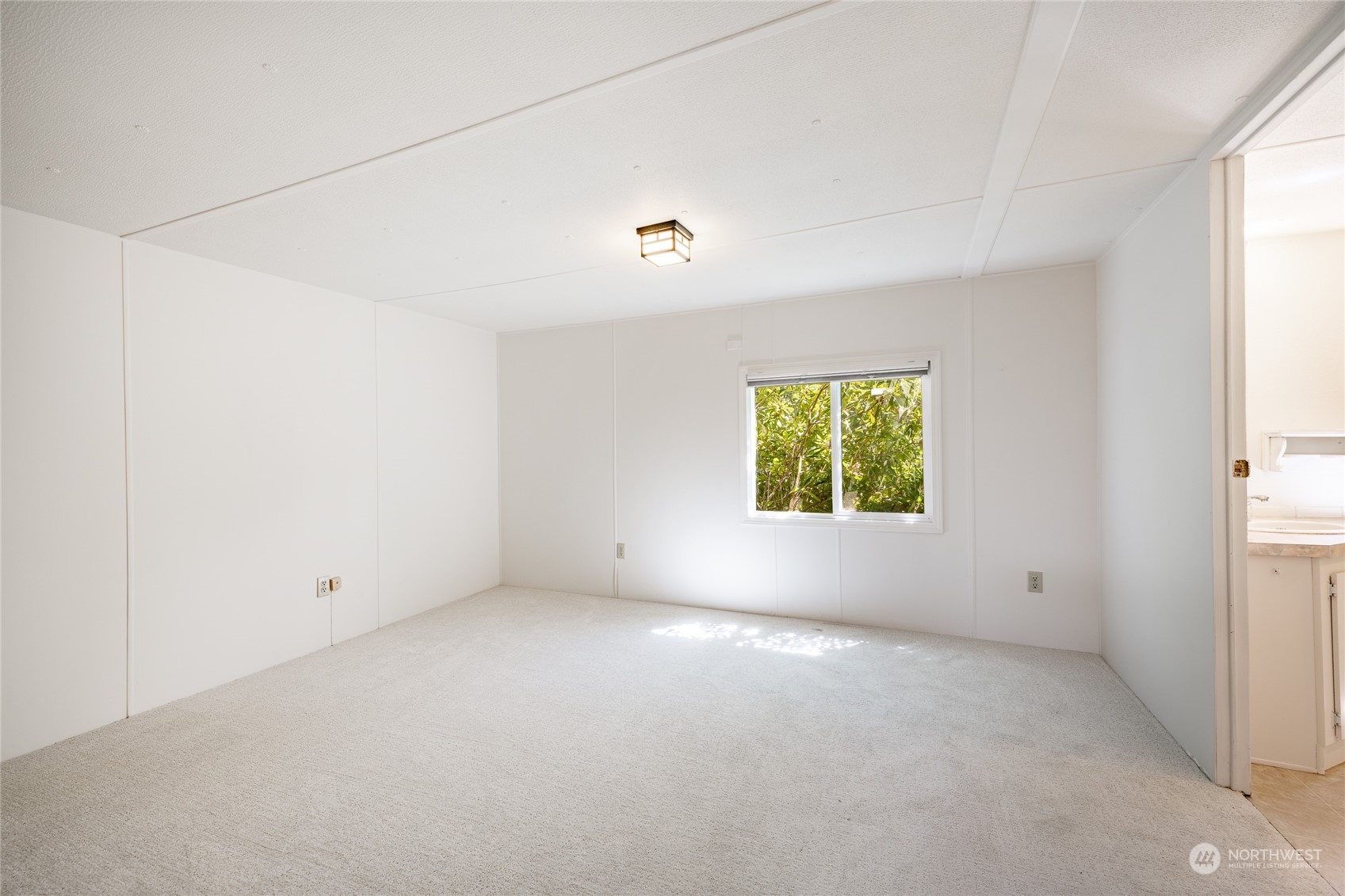 4915 Samish Way, Unit 7 Bellingham, WA 98229 - Photo 17 of 26 an empty room with windows