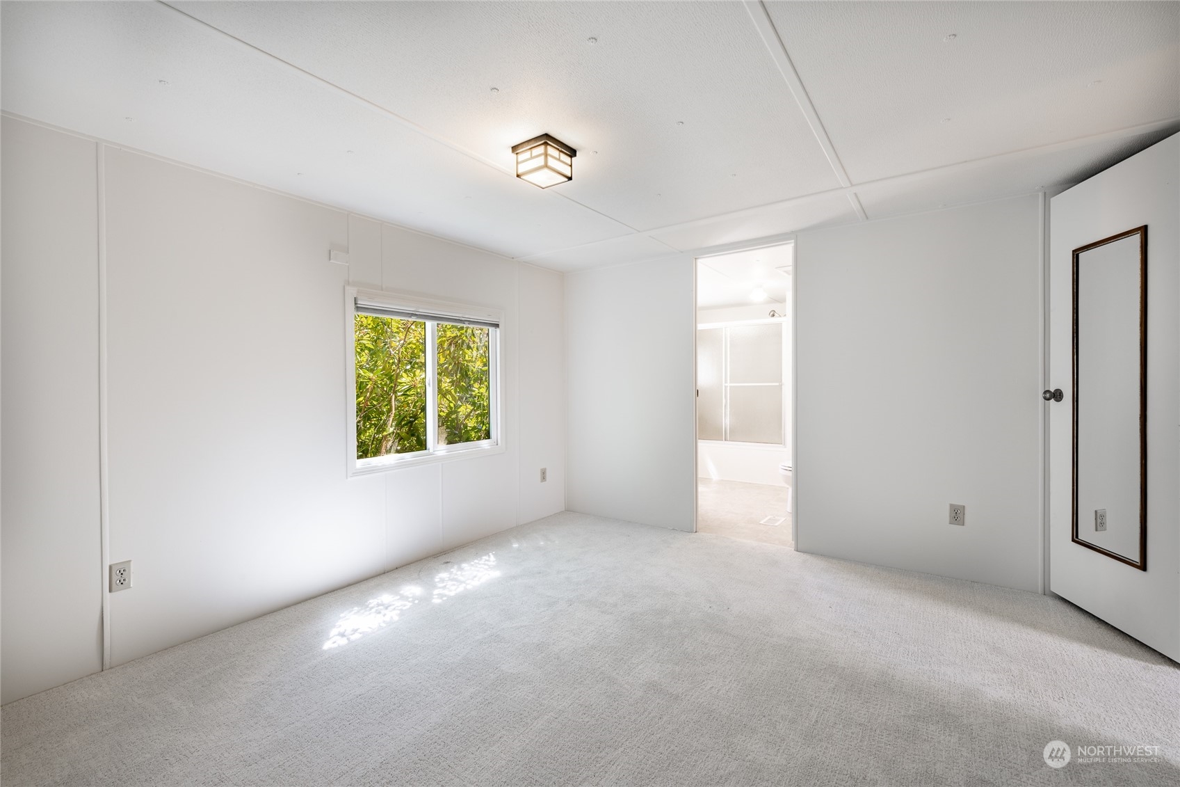 4915 Samish Way, Unit 7 Bellingham, WA 98229 - Photo 18 of 26 an empty room with windows