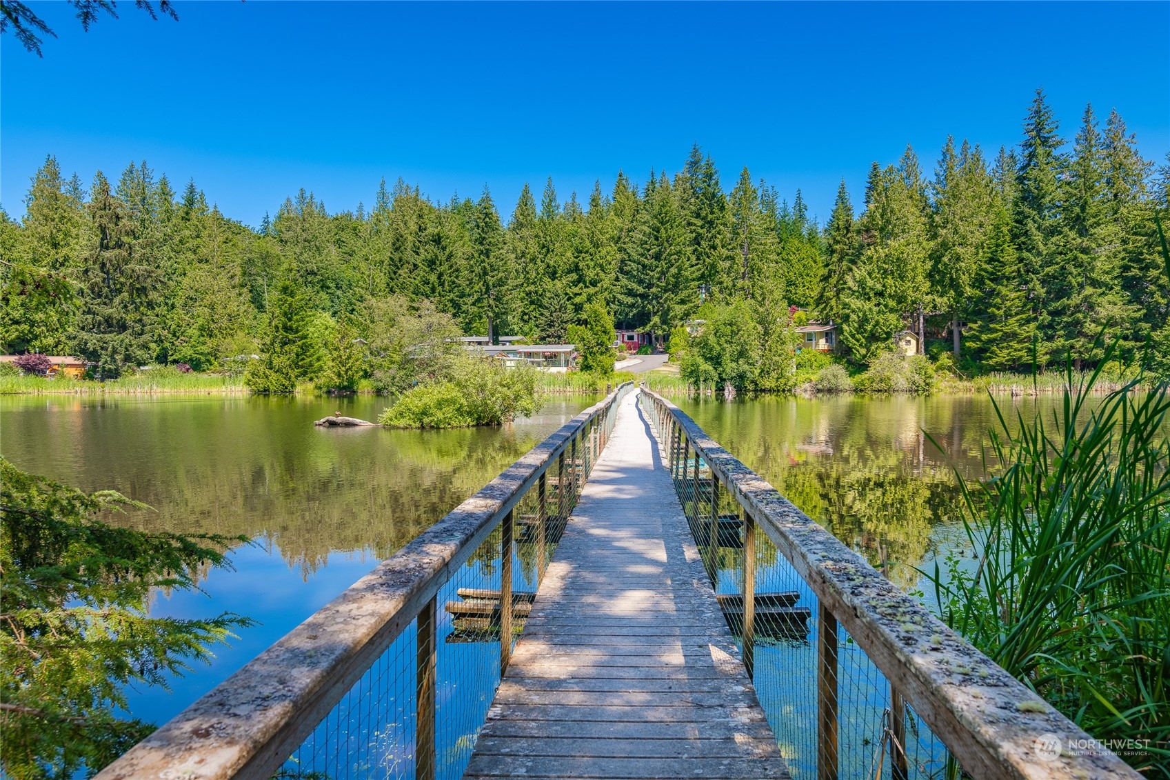 4915 Samish Way, Unit 7 Bellingham, WA 98229 - Photo 22 of 26 a view of a lake from a balcony