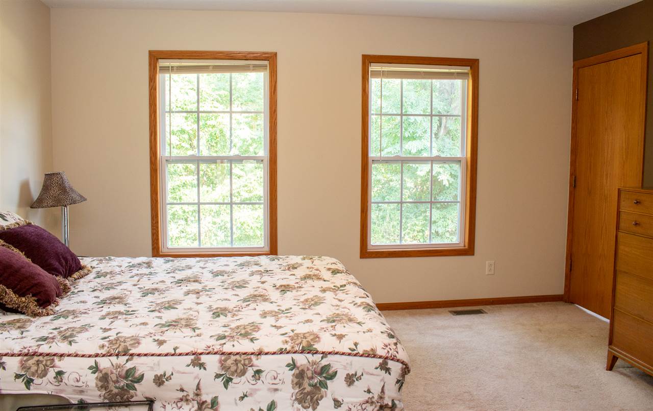 5654 Tipple Road Rockford, IL 61102 - Photo 18 of 33 a bedroom with a bed and a window