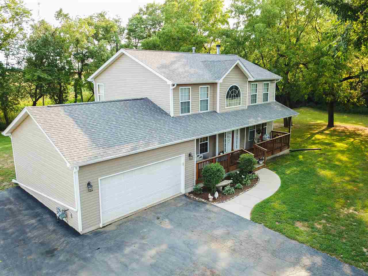 5654 Tipple Road Rockford, IL 61102 - Photo 3 of 33 a house view with a garden space