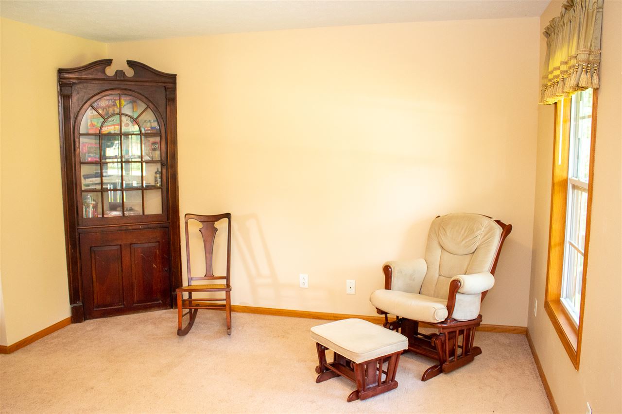 5654 Tipple Road Rockford, IL 61102 - Photo 5 of 33 a living room with furniture and a window