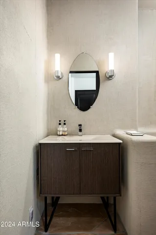 a patio with a yard table and chairs