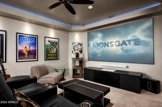 an aerial view of a house with yard swimming pool and outdoor seating